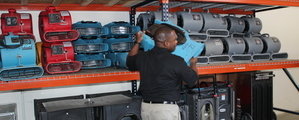 Water Damage Monrovia Restoration Technician Mobilizing Air Movers