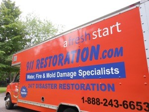 Water Damage Nineveh Restoration Truck Parked At Residential Job Site